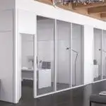 Mamparas de Panelart Melamínico para Interiores Modernos Guadalajara Mamparas de Panelart Melamínico en un diseño contemporáneo para interiores de oficina en Guadalajara, con acabados variados.