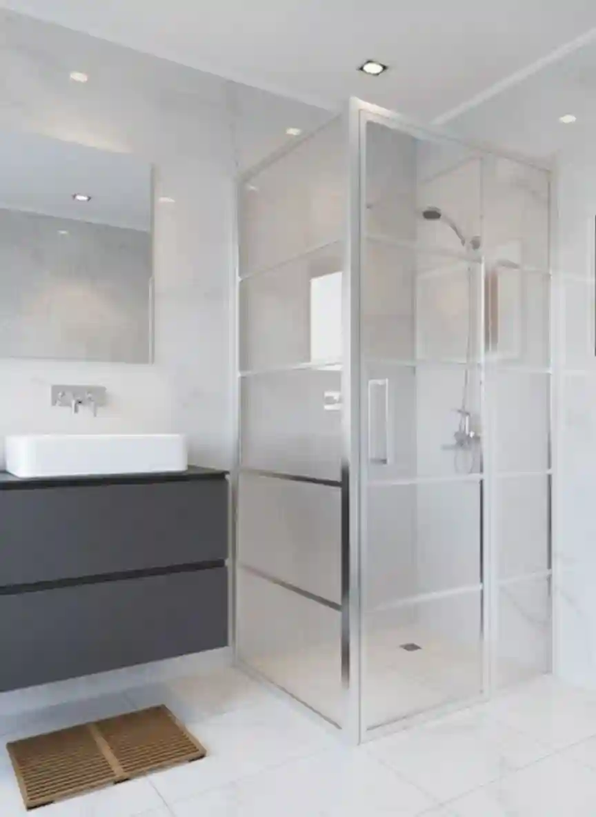 Cancel de Baño con Perfilería Minimalista Diseño Esmerilado Transparente Edomex Moderno cancel de baño de cristal con perfilería minimalista y paneles esmerilados combinados con transparentes, ideal para un estilo contemporáneo en baños residenciales de Lerma, Ocoyoacac y Capulhuac, Estado de México.